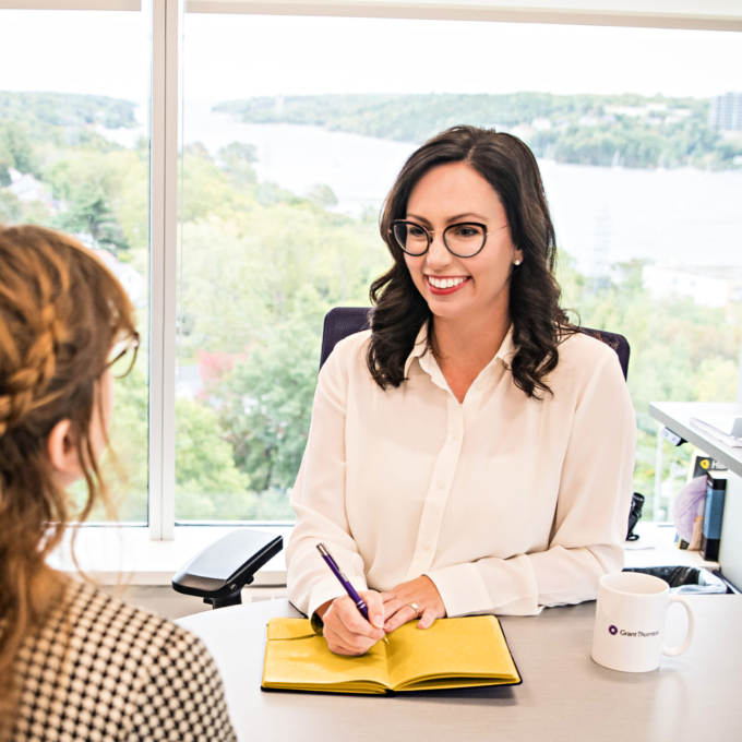 Woman meeting with a Licensed Insolvency Trustee for a free consultation