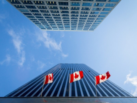 Bank of Canada office buildings with three Canadian flags