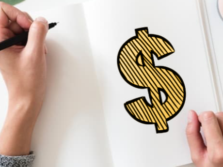 Person holding a pen drawing a large dollar sign on a piece of paper