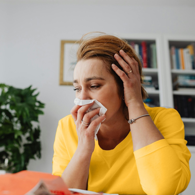 woman crying and looking discouraged