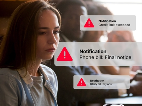 Young woman looking sad with phone notifications appearing behind her saying that she is overdue on bills and her credit limit has been exceeded.